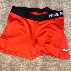 red nike pros